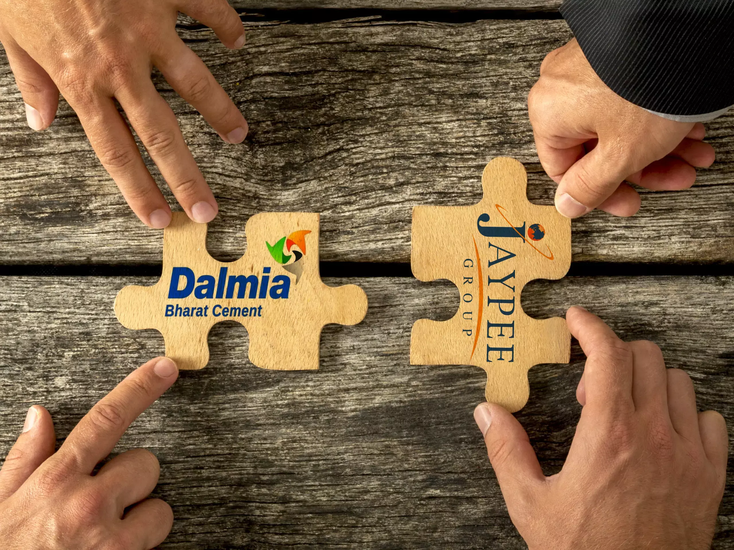dalmia bharat ltd laypee group cement asset acquistion