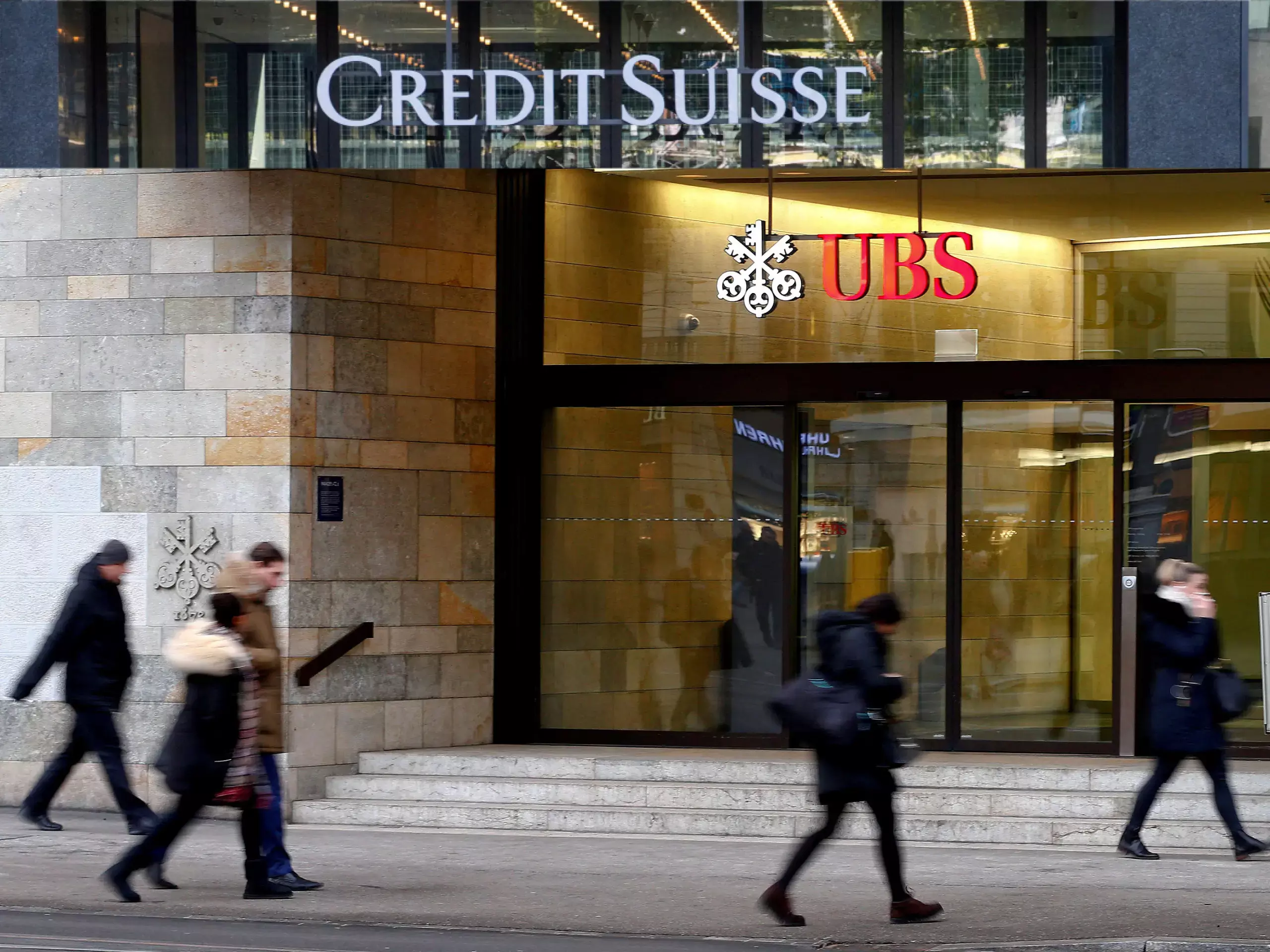credit suisse-ubs deal to cut 9,000 jobs