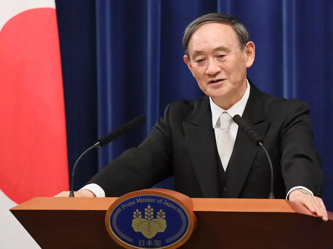 business environment improve for japanese companies suga