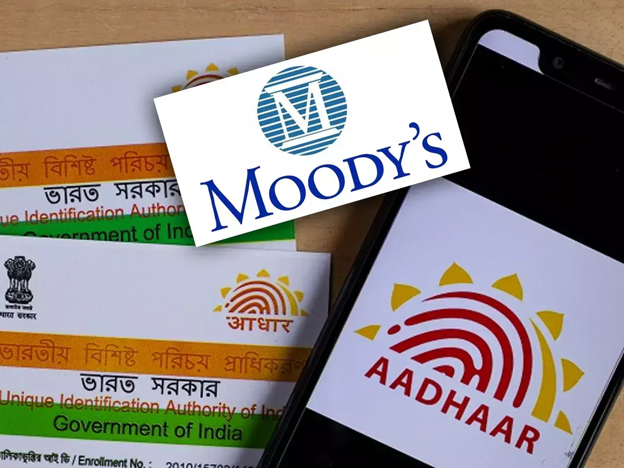 rating agency moodys has doubts about the security of aadhaar