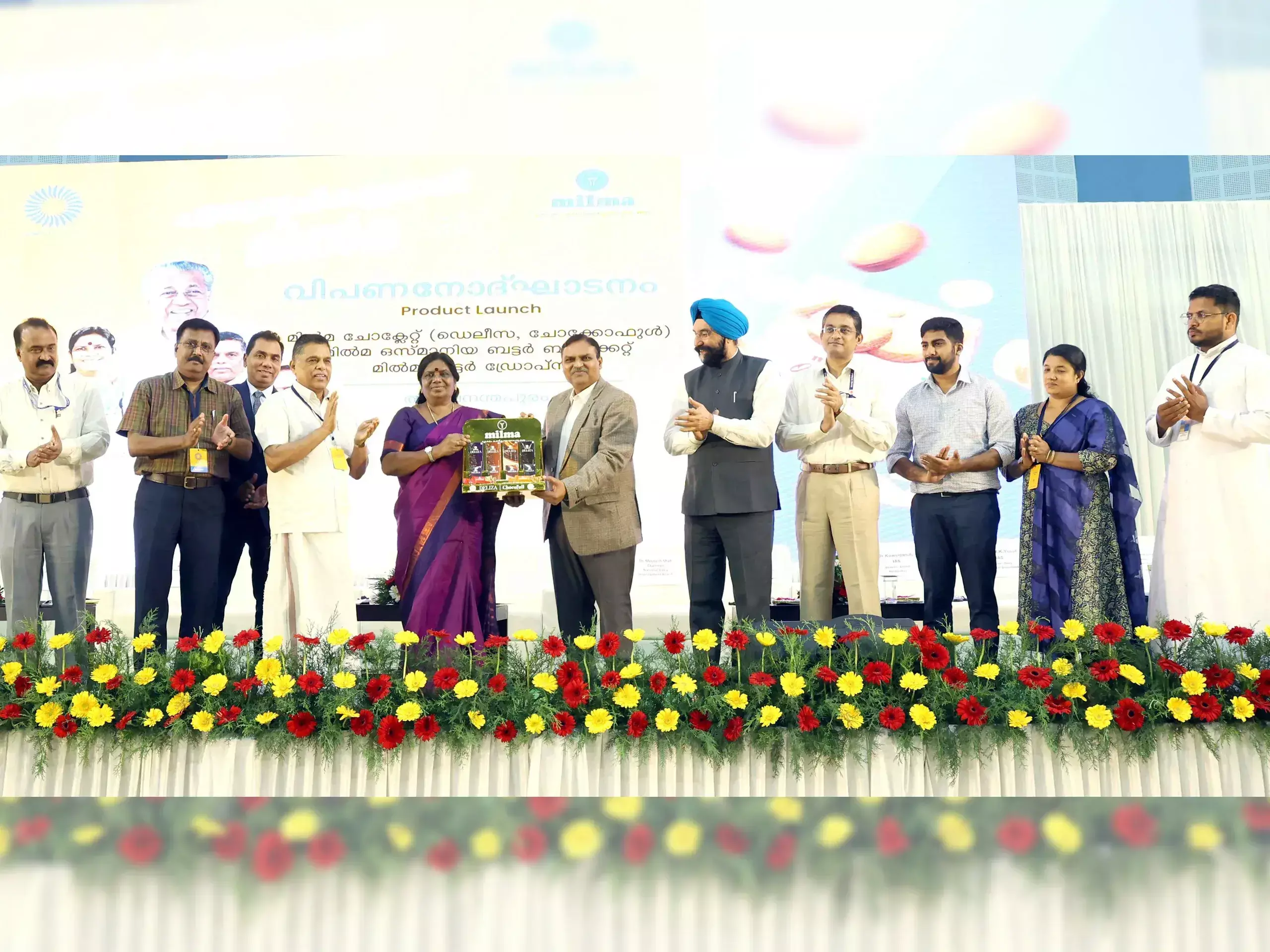 milma with a variety of dark chocolate and butter biscuit products