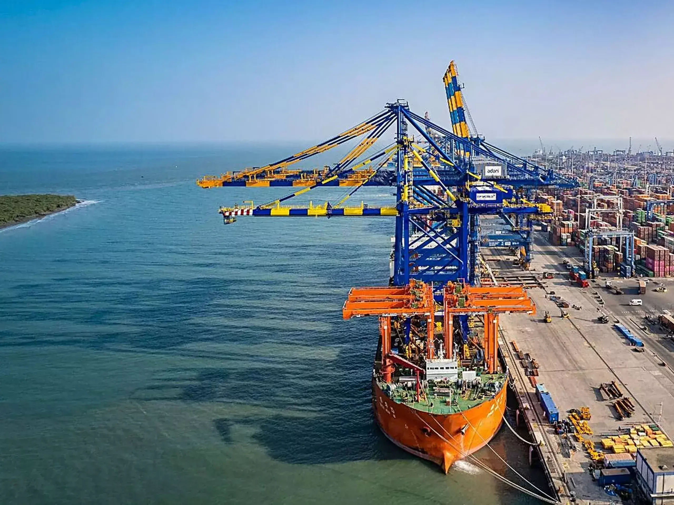 adani ports to sell 49% stake in aectpl to mundi ltd