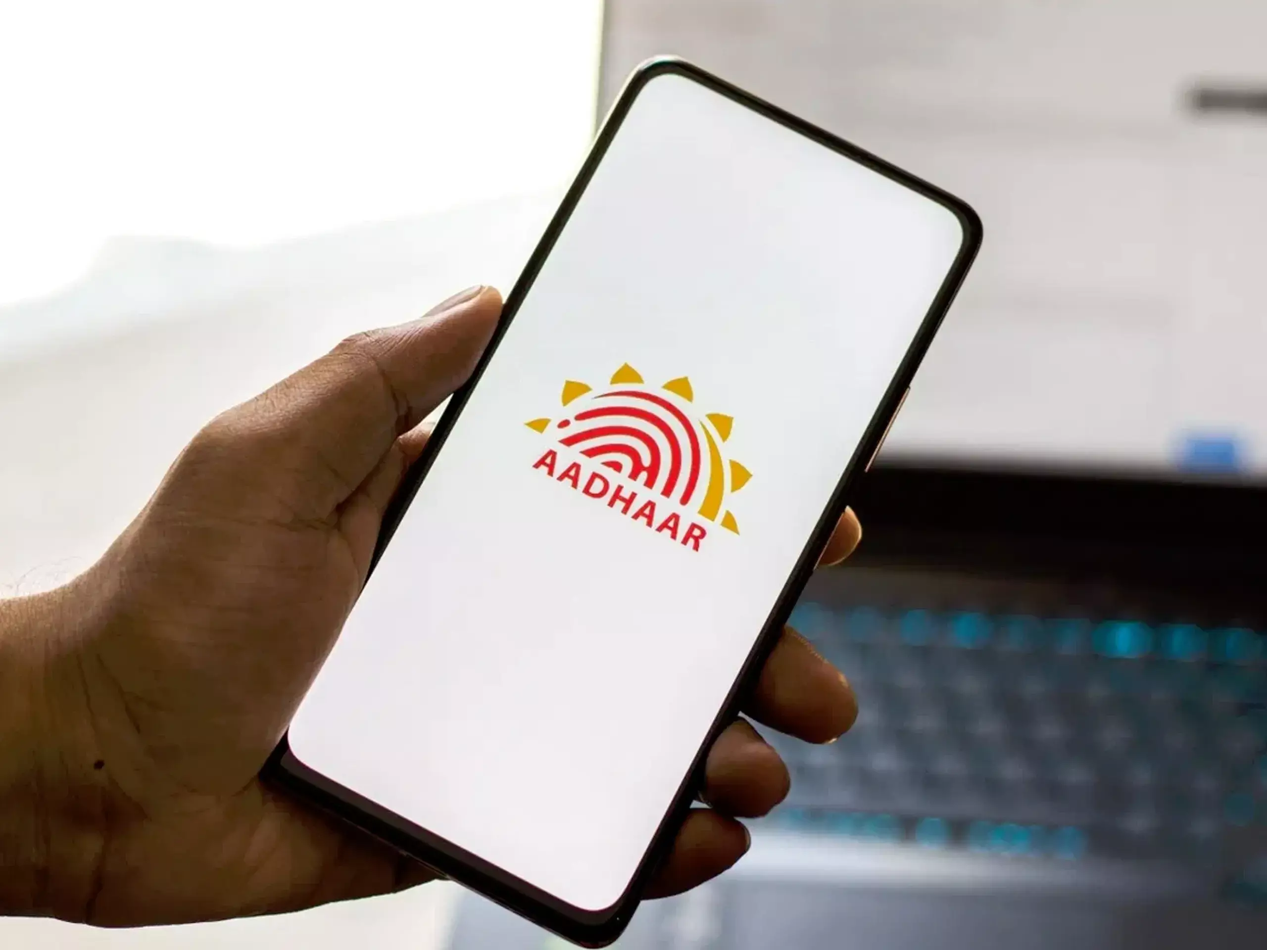 Rs 50,000 fine for overcharging for Aadhaar services