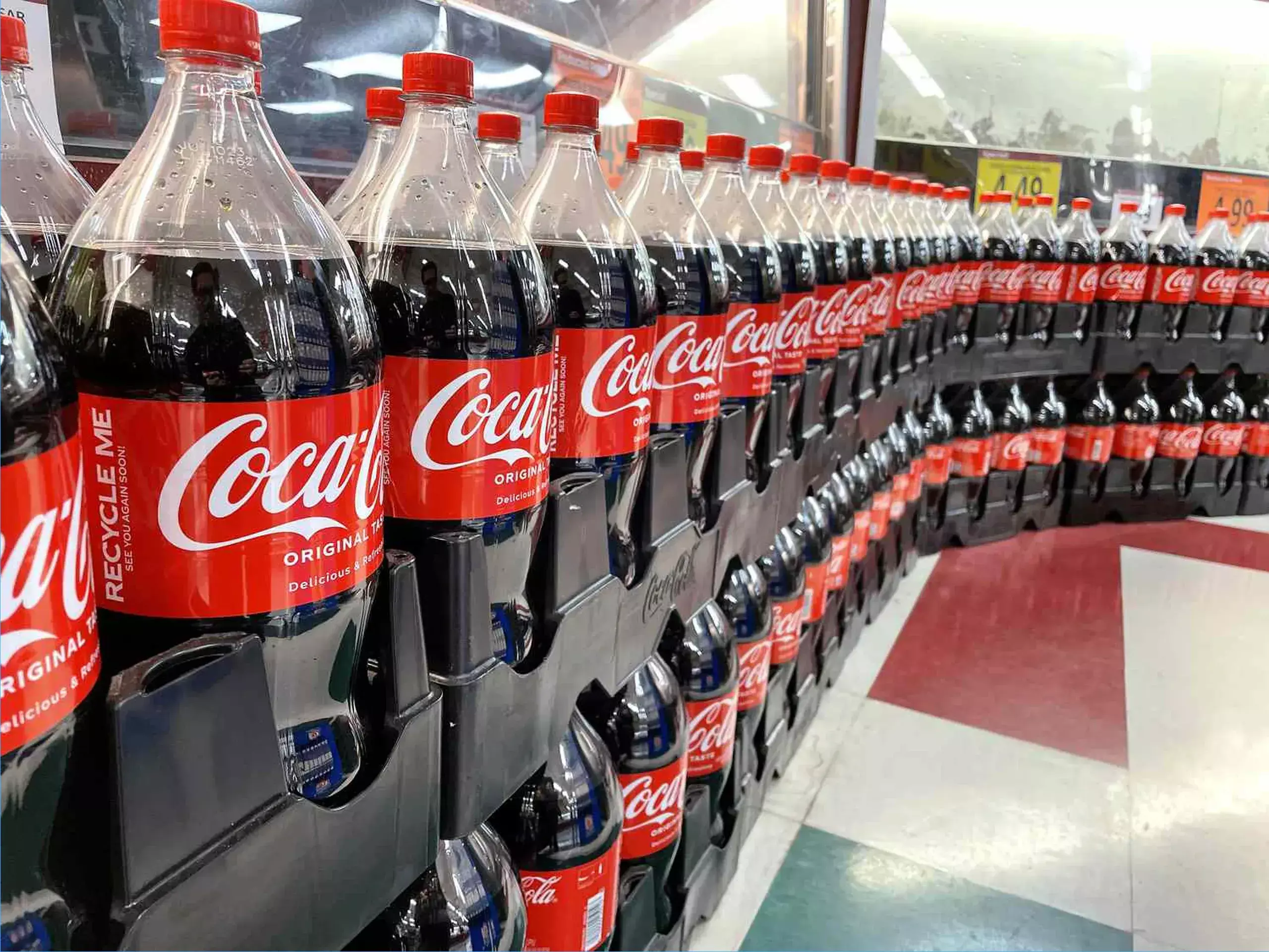 coca-cola bottling is handed over to local partners