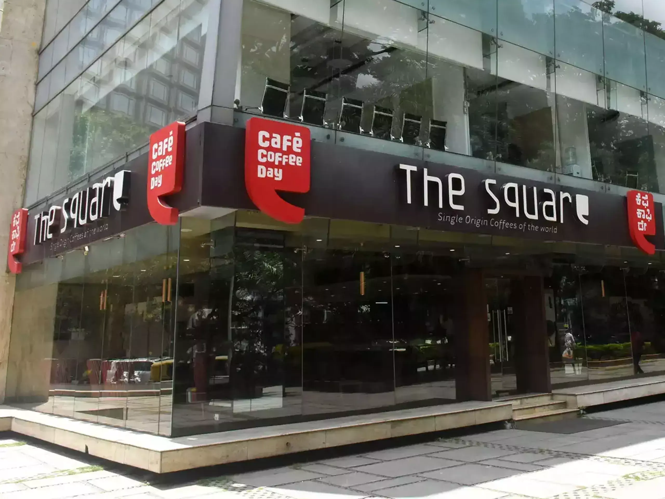 strata acquires bangalore cafe coffee day headquarters