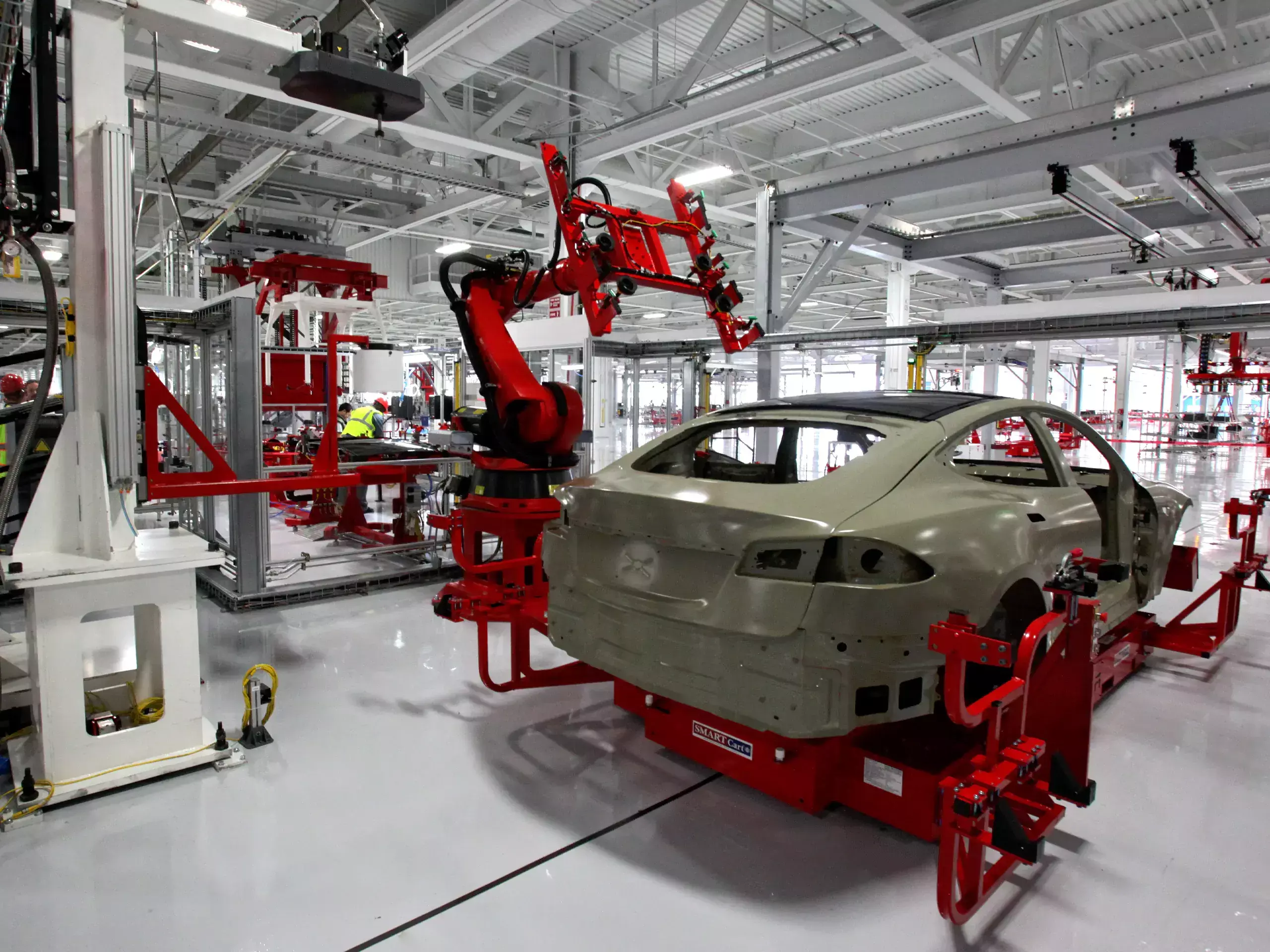 cheap vehicles, tesla to use existing factories only