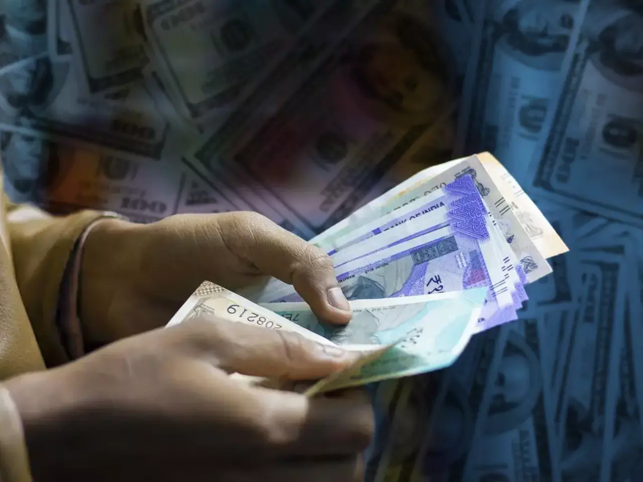 rupee rises 33 paise to 85.77