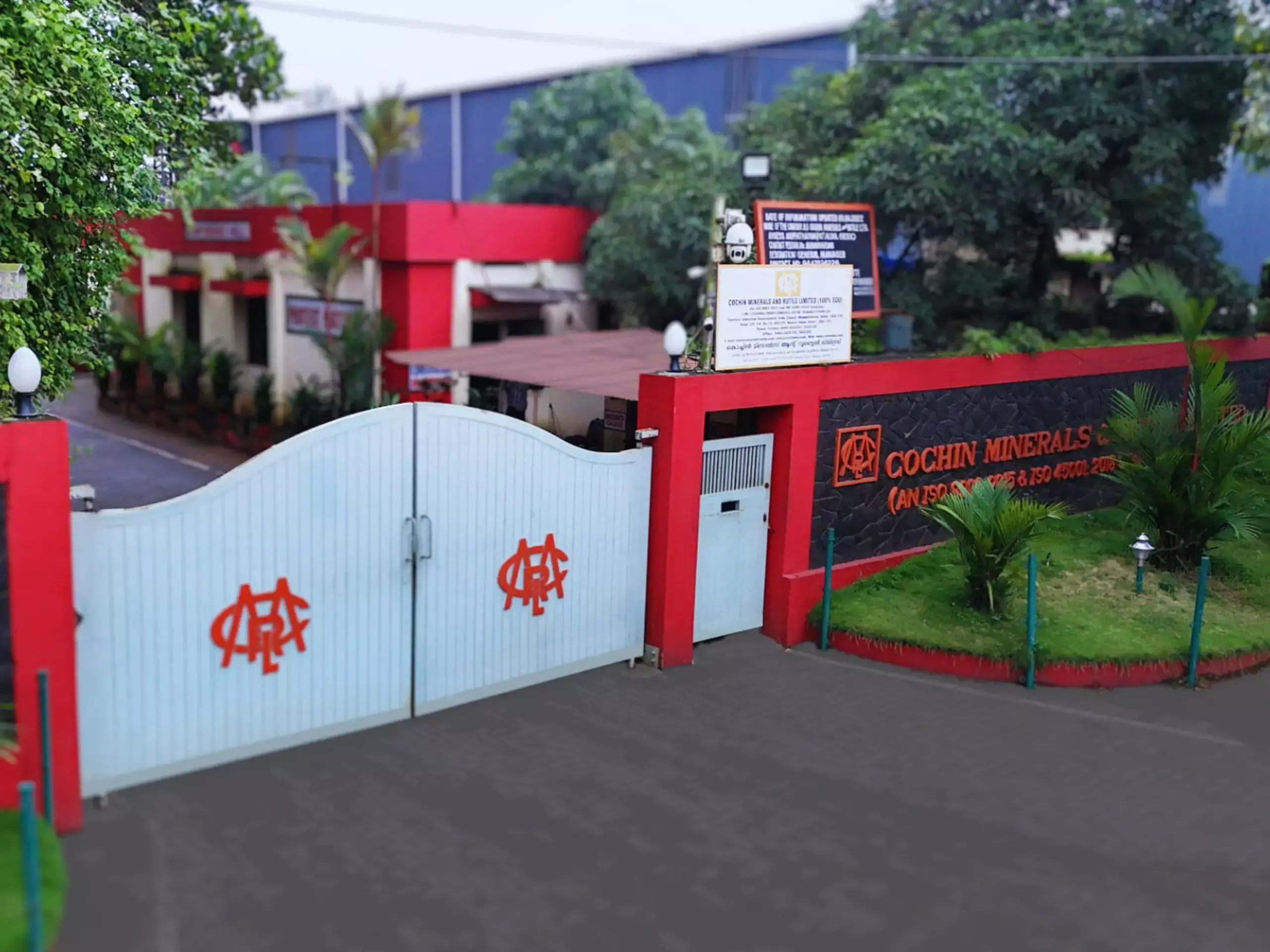 Cochin Minerals and Rutile Limited (CMRL) company logo and office building setup with ED investigation graphic overlay.Cochin Minerals and Rutile Limited (CMRL) company logo and office building setup with ED investigation graphic overlay. Cochin Minerals and Rutile Limited (CMRL) company logo and office building setup with ED investigation graphic overlay.Cochin Minerals and Rutile Limited (CMRL) company logo and office building setup with ED investigation graphic overlay.